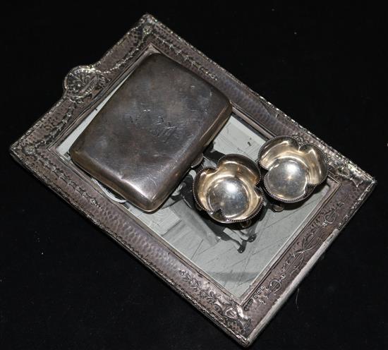 A silver photograph frame, cigarette case and pair of salts.